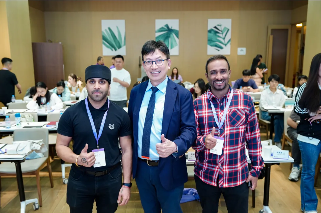 Dr Sandeep Sadana, Dr Wyman Chan and Dr Niki Shah at a Wyman Chan training session — three of the DOCS partner clinicians, thumbs up.