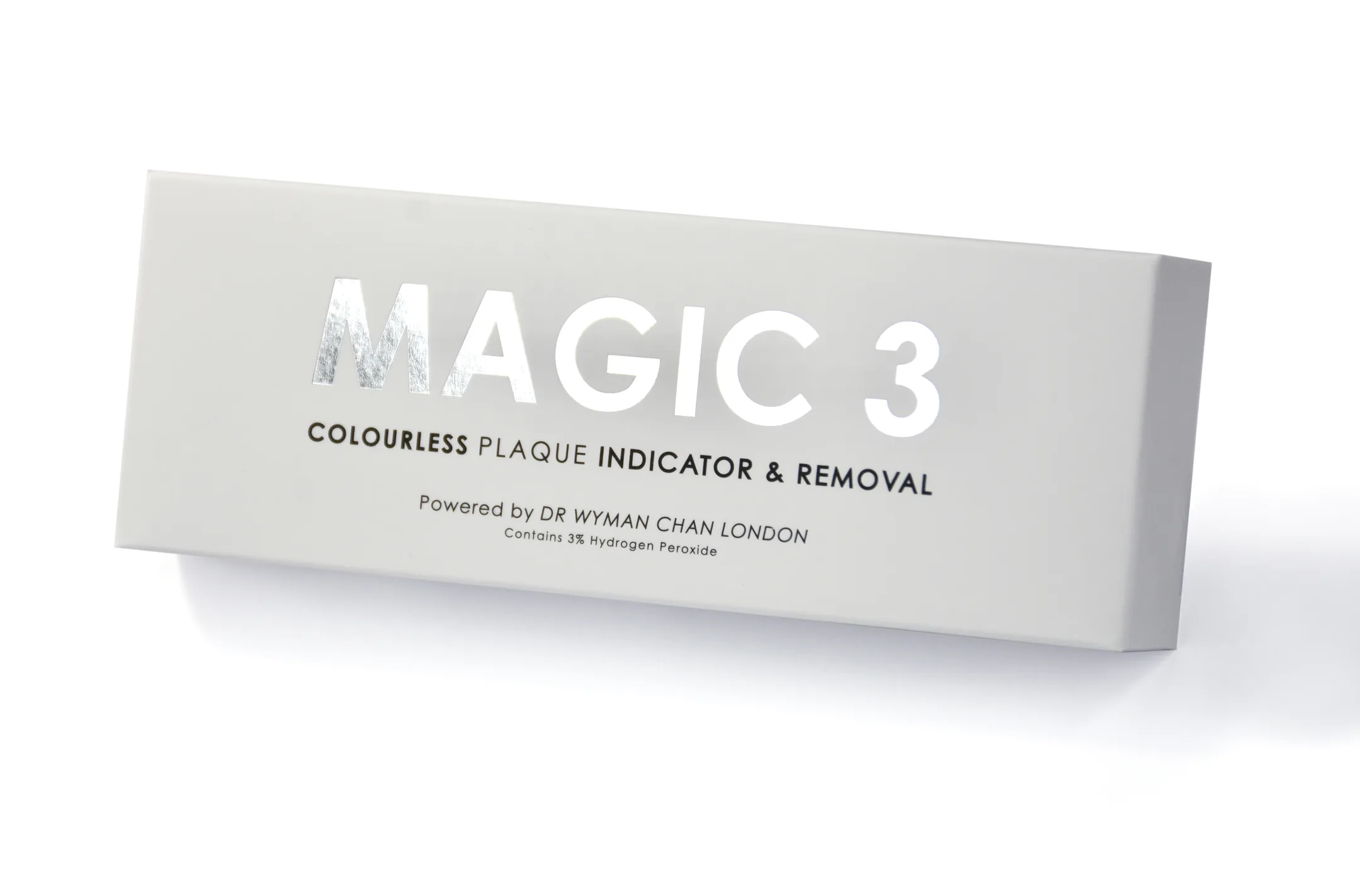 Magic 3 box: silver foil-stamped logo reading MAGIC 3, with 'Colourless Plaque Indicator & Removal — Powered by Dr Wyman Chan London' on a clean white studio background.
