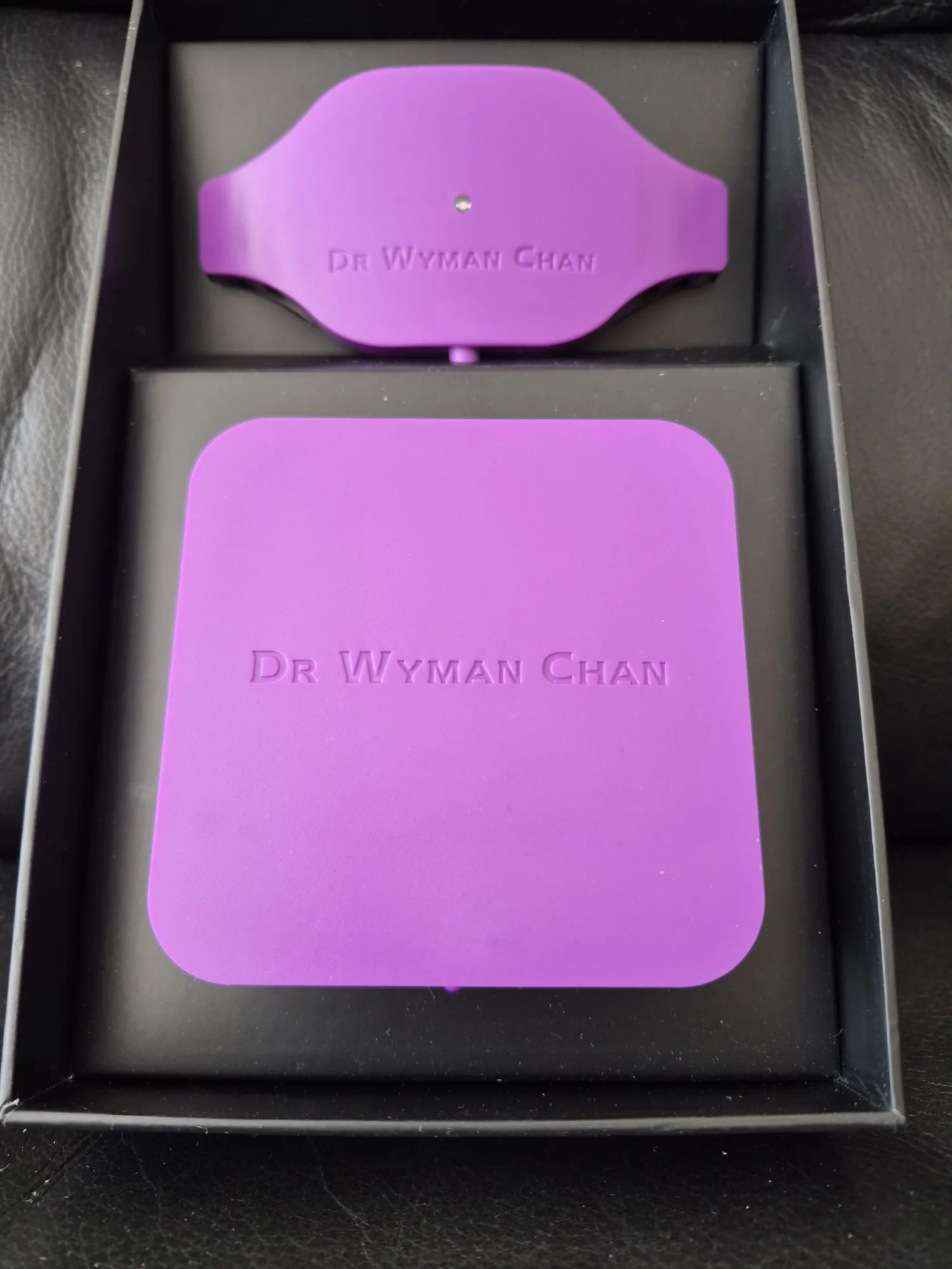 Wy10 Heat Diffuser pink silicone pad and mount clip in a Dr Wyman Chan branded box